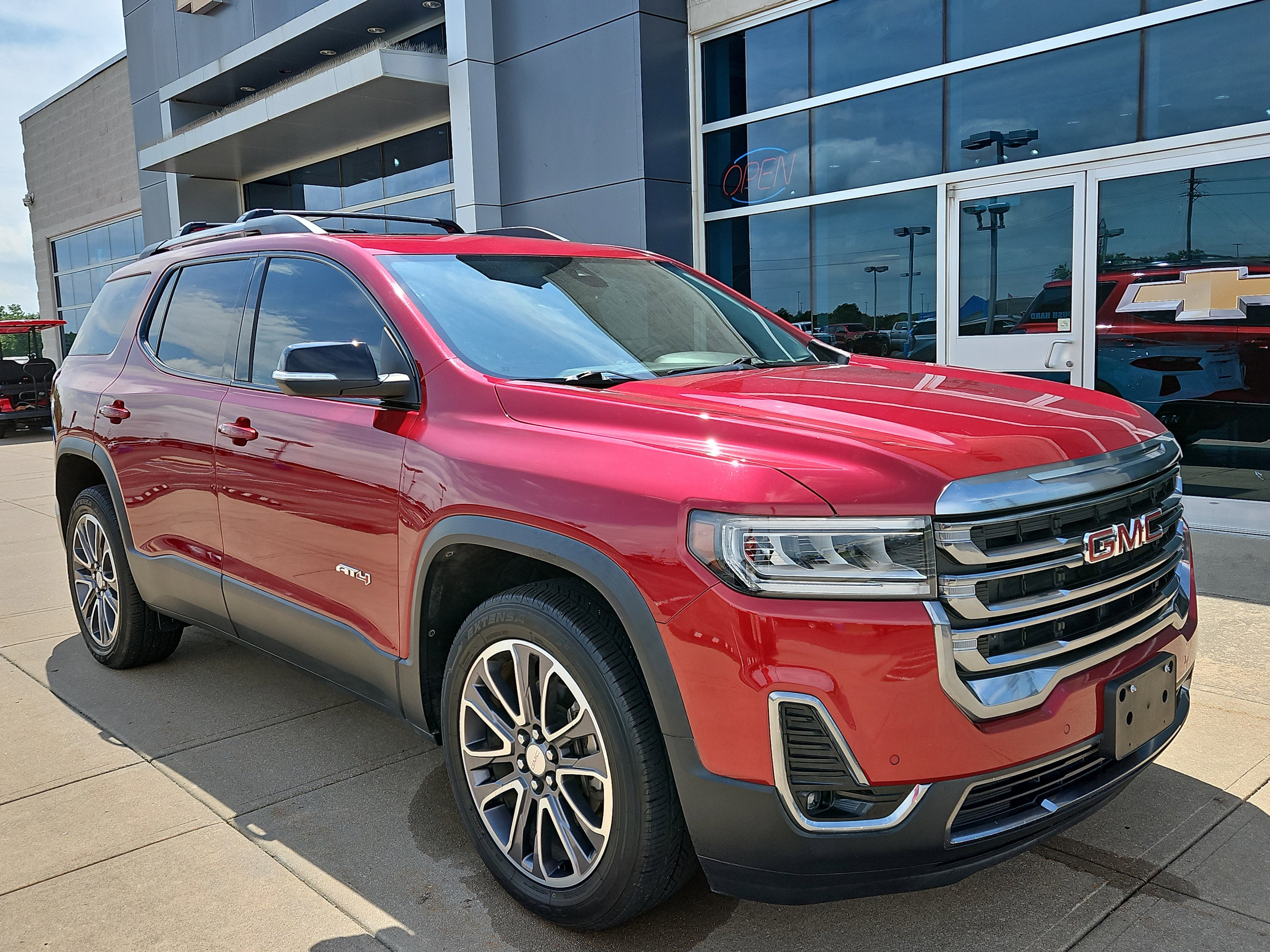 2020 GMC Acadia AT4 in Red Quartz Tintcoat — front three-quarter view