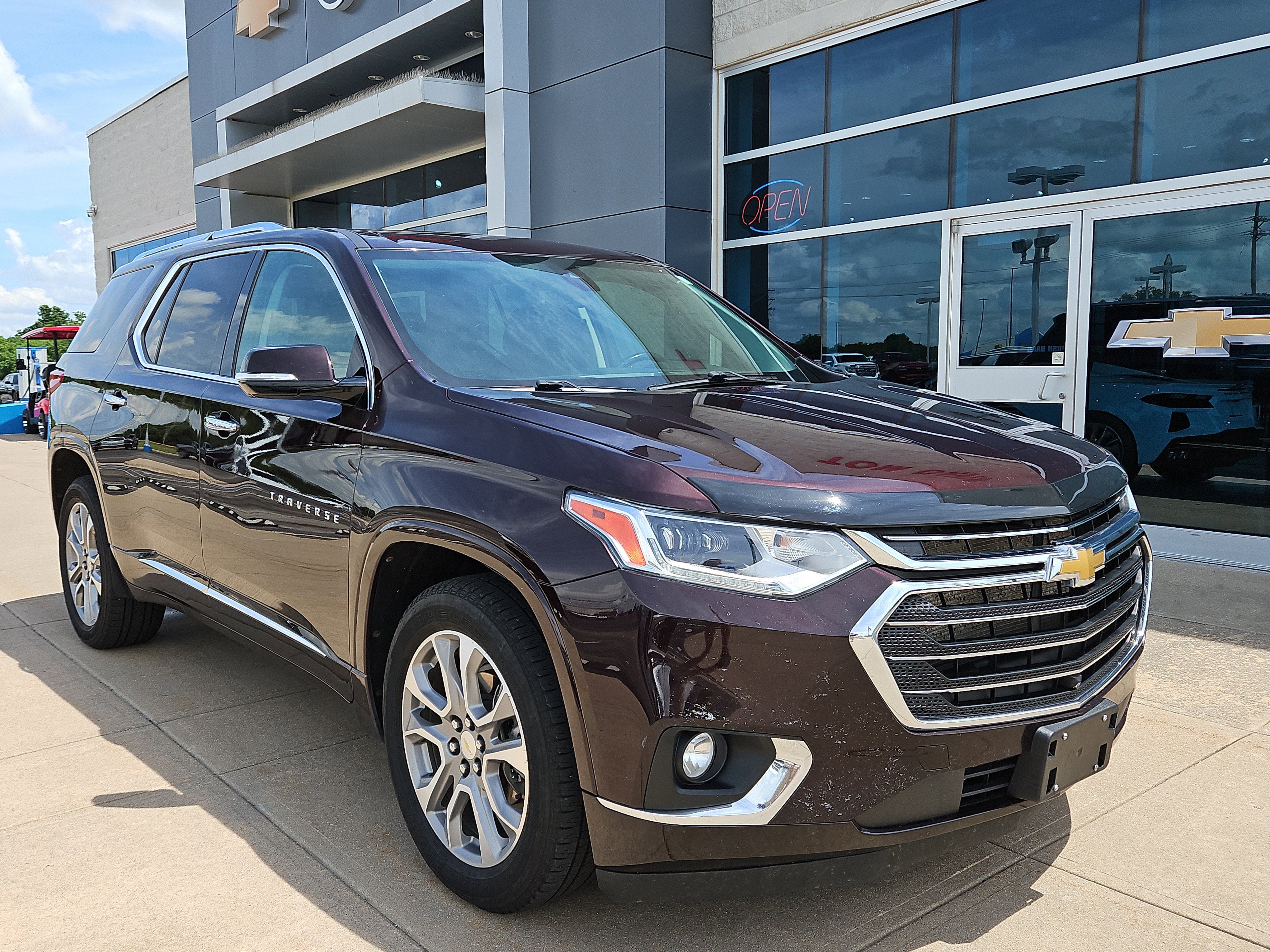 2021 Chevrolet Traverse Premier in Black Cherry Metallic — front three-quarter view