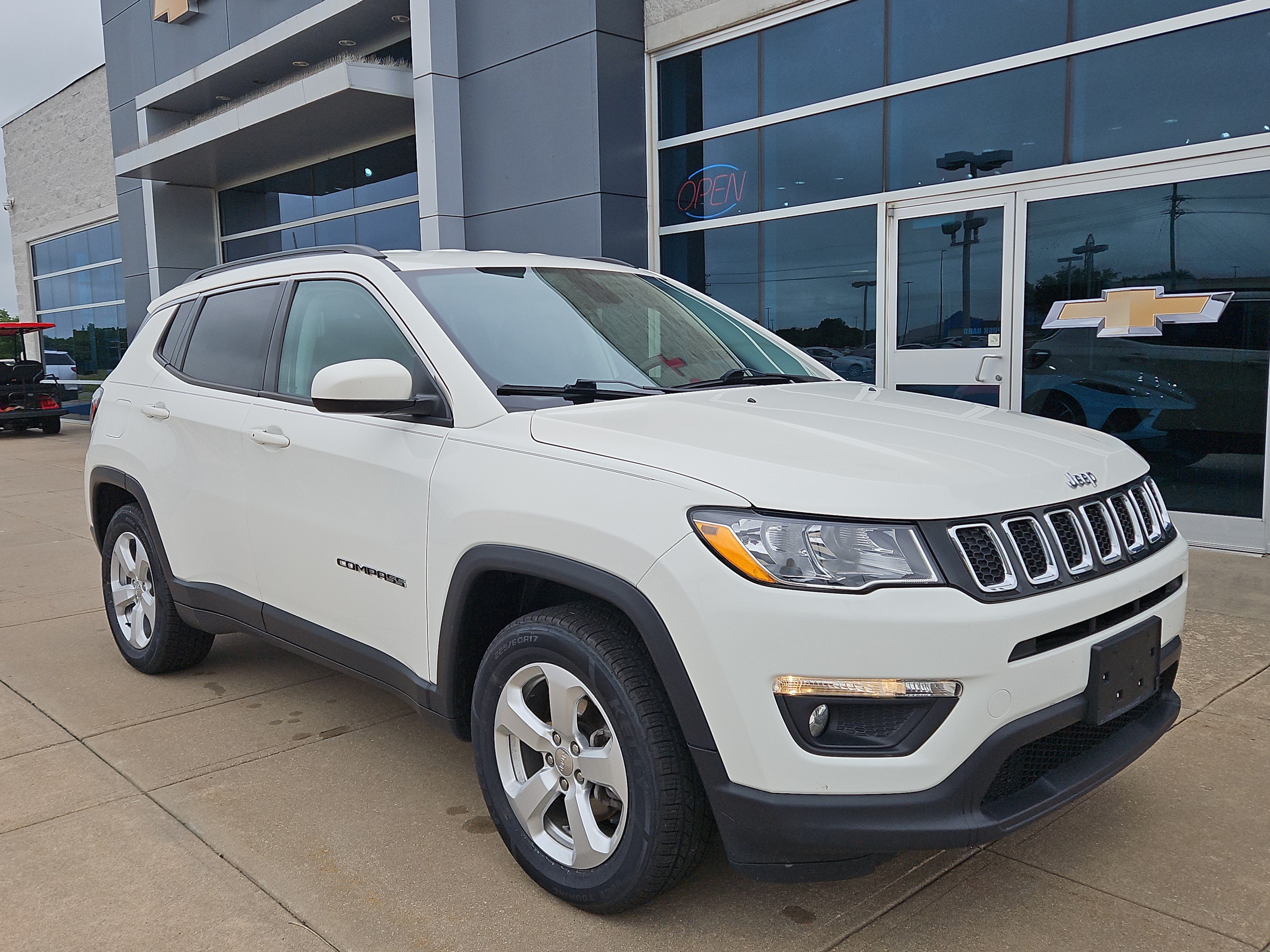2020 Jeep Compass Latitude in White — front three-quarter view