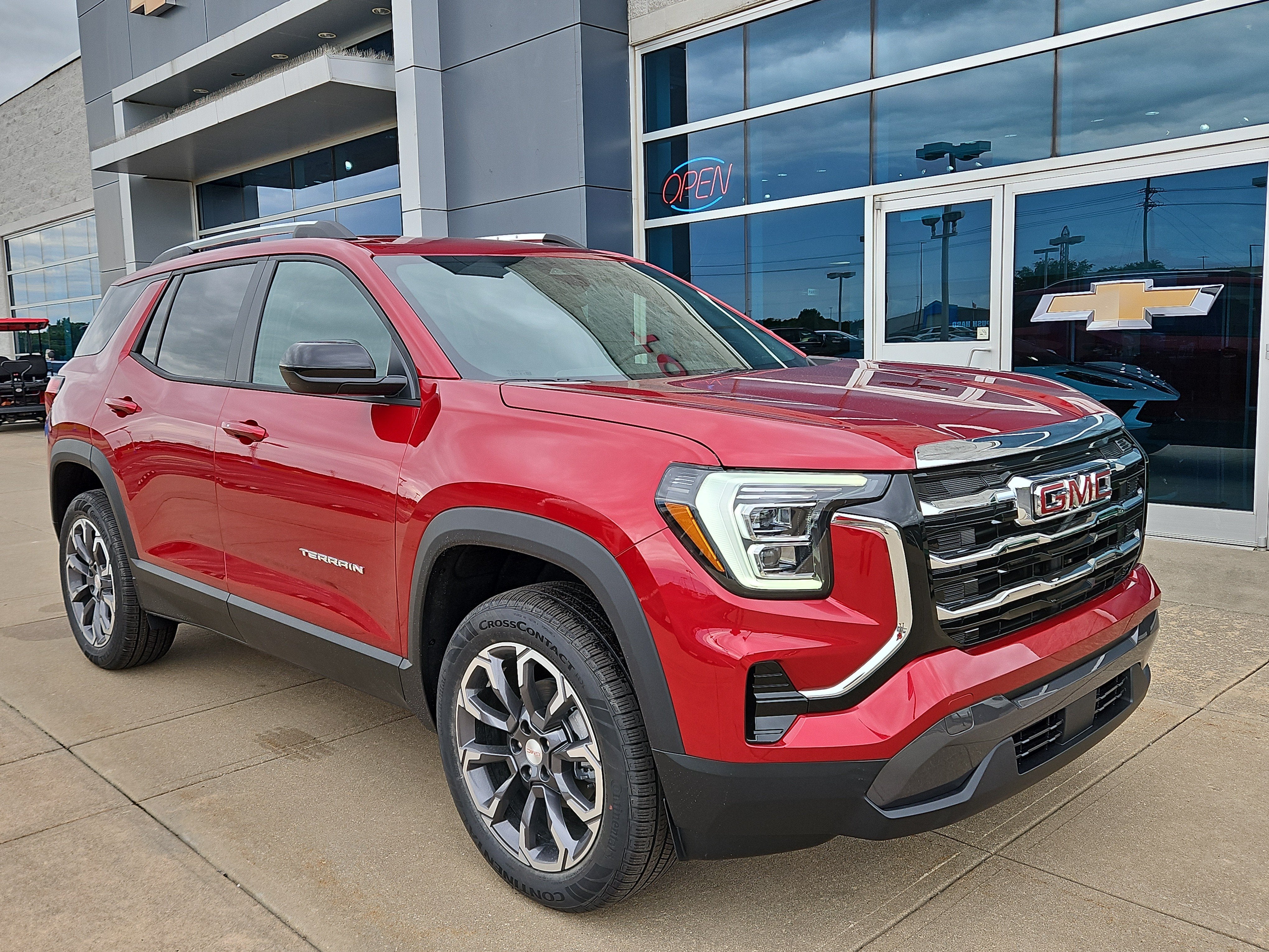 2027 GMC Terrain FWD Elevation in Volcanic Red Tintcoat — front three-quarter view