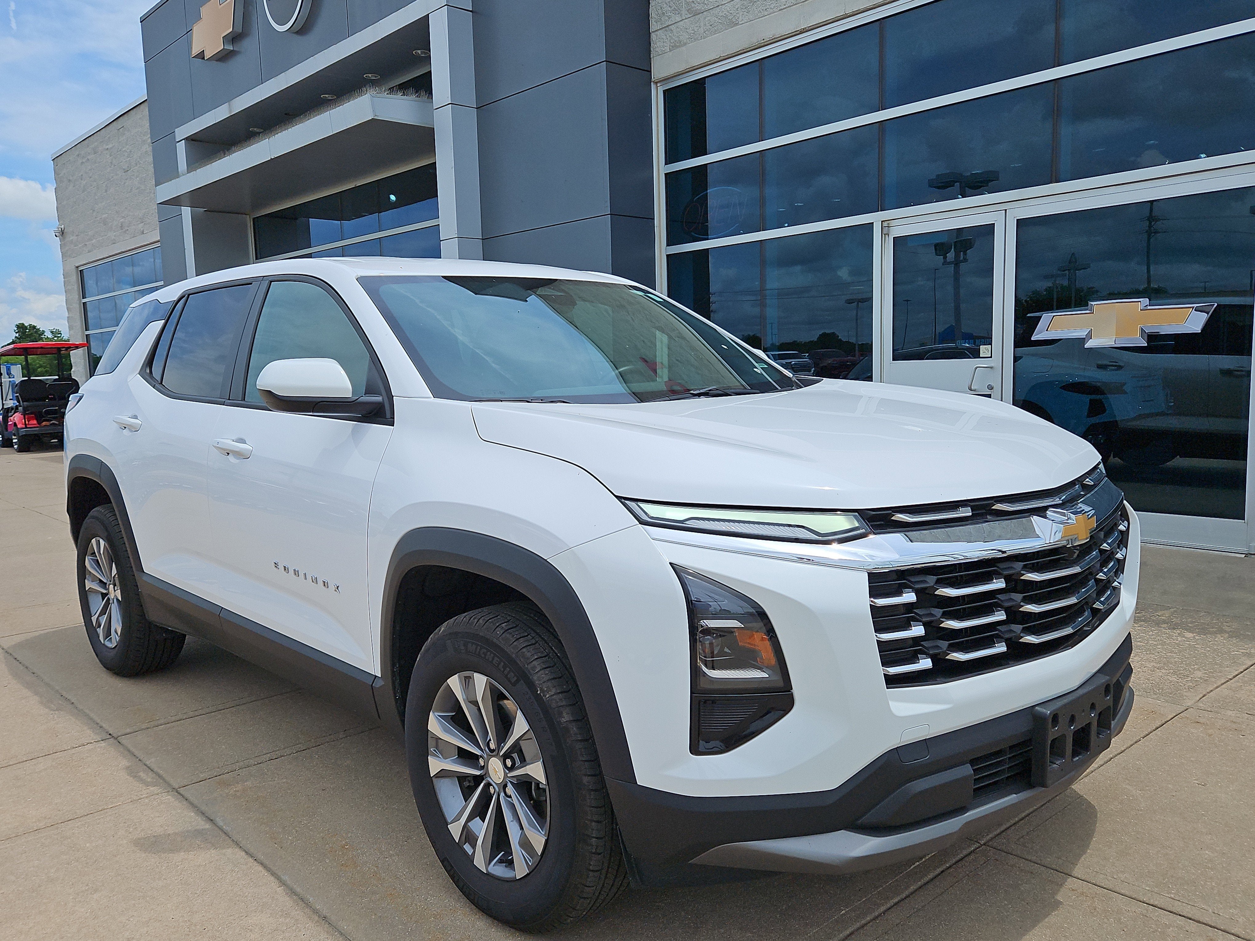 2025 Chevrolet Equinox LT in Summit White — front three-quarter view