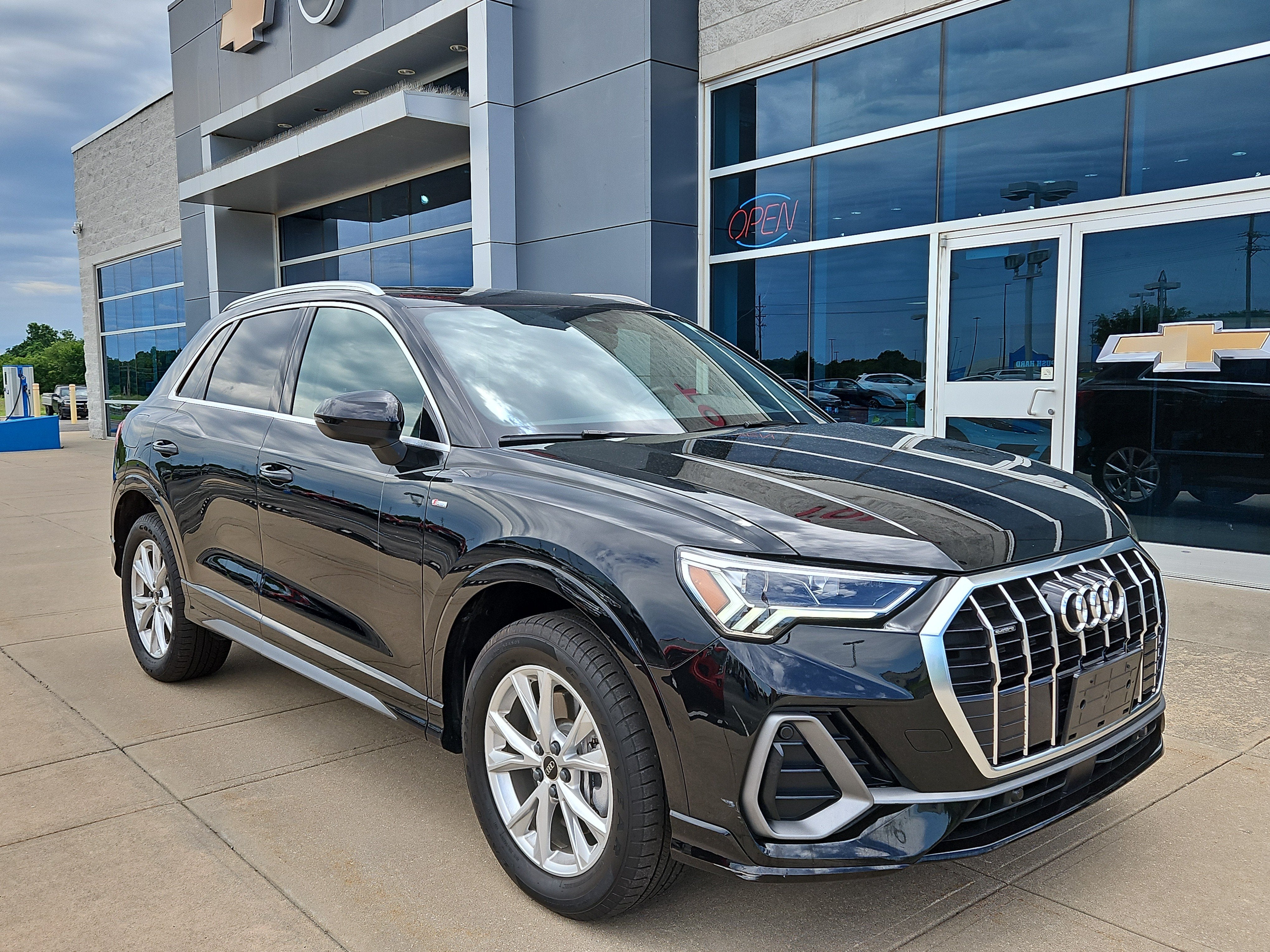 2025 Audi Q3 S line Premium in Black — front three-quarter view